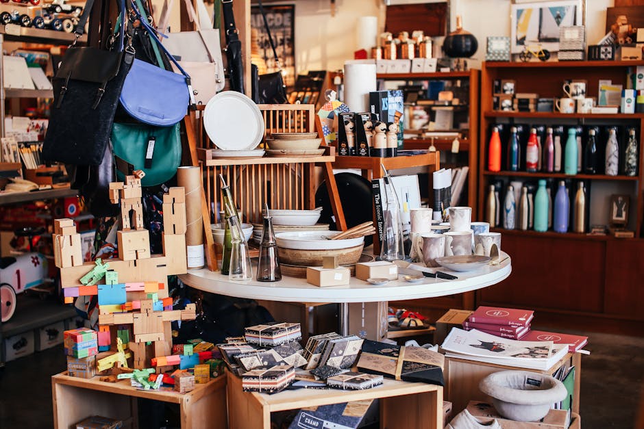 A modern retail store showcasing assorted homewares, accessories, and decor items on display.